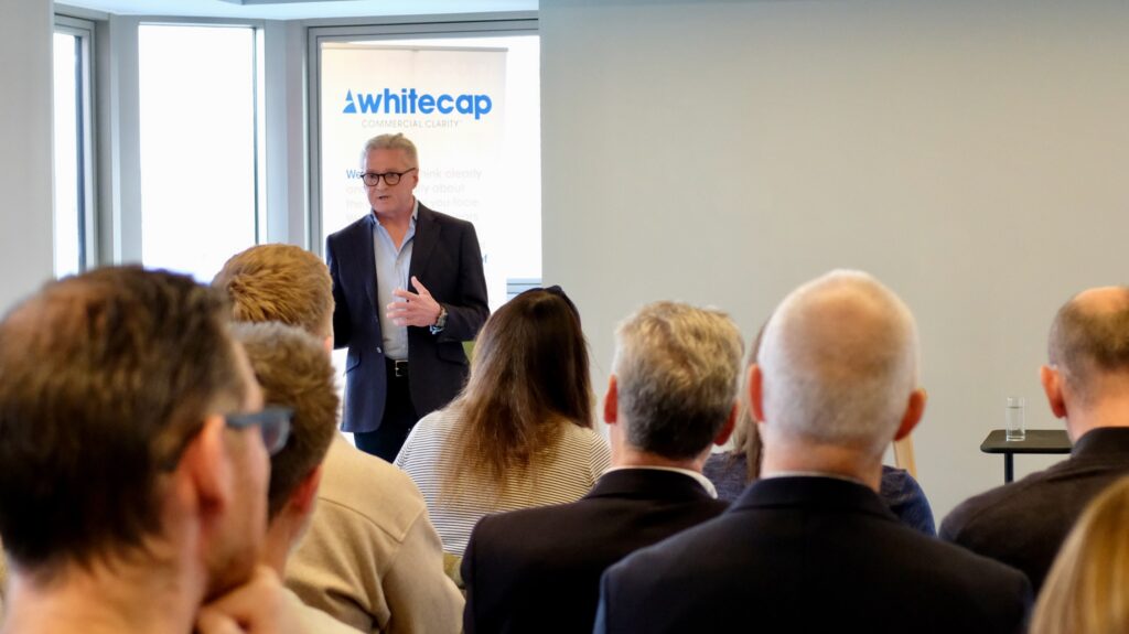 Richard Coates, Managing Director at Whitecap Consulting, delivers insights on business strategy and technology at the CEO Strategy Forum, engaging the audience with his expertise.